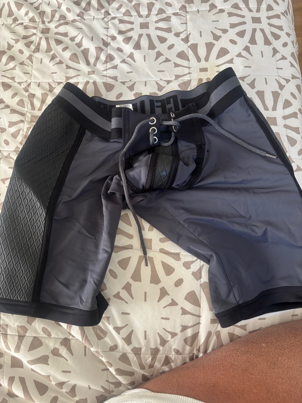 Men's Gray neoprene and with Drawstring front, small tiny hole in front as shown